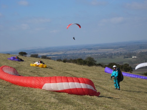 A spring day on classic English paragliding and hang gliding site Combe Gibbet in early March 2010. Under the proposed rules this would be banned. Photograph: Ed Ewing A spring day on classic English paragliding and hang gliding site Combe Gibbet in early March 2010. Under the proposed rules this would be banned. Photograph: Ed Ewing