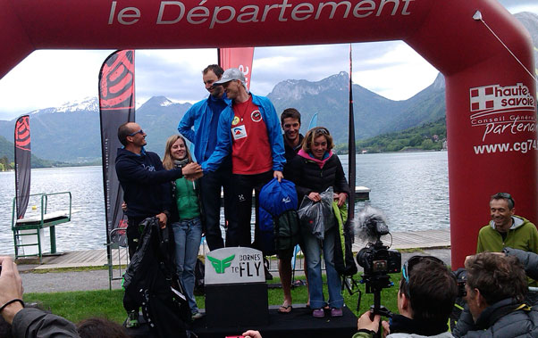 Winner Martin Muller congratulates the others on the podium. Photo: Andy Pag