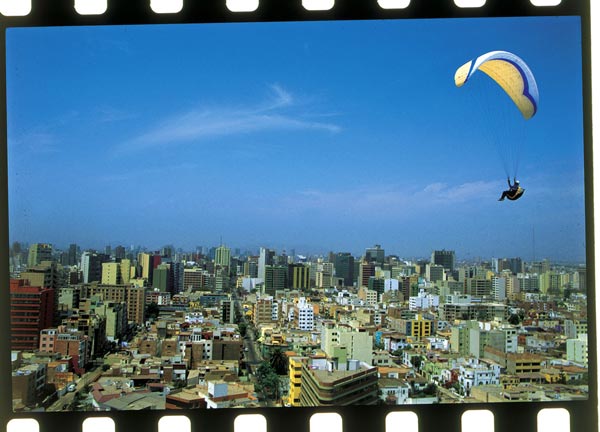 Mathias flying above Lima, Peru. Photo: Jerome Maupoint