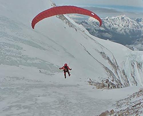'Woo-hoo!’ Michel Rudolf launches his sub-3kg lightweight paraglider from 7,400 m on Manaslu