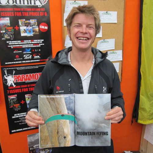 Felix the Cat, with his photos in the latest issue of Cross Country magazine
