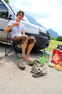 Charlie eating lunch and changing shoes before the next section of the hike