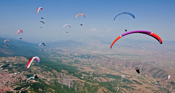 If you don't want to read all this dry stuff about testing, just look at this picture instead. Action from the Paragliding World Cup in Krushevo, Macedonia. Photo: Martin Scheel