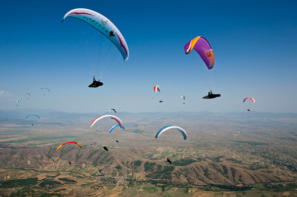 Action at the Paragliding World Cup in Krushevo, Macedonia. Photo: Martin Scheel