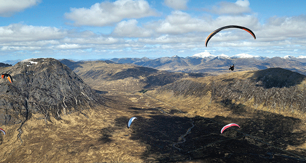 Buachaille Etive Mor on the left, with snowclad Ben Nevis on the horizon. Photo: Jerome Maupoint