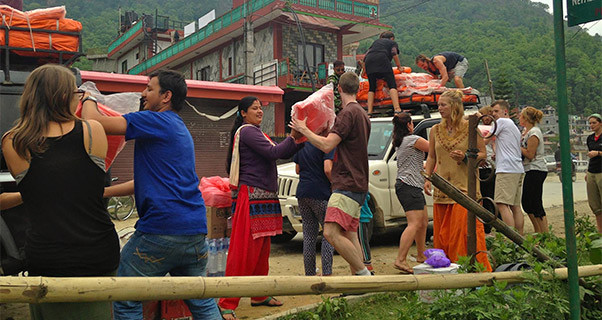Pilots in Nepal load aid for local villages hit by the Nepal earthquake. Photo: Karma Flights