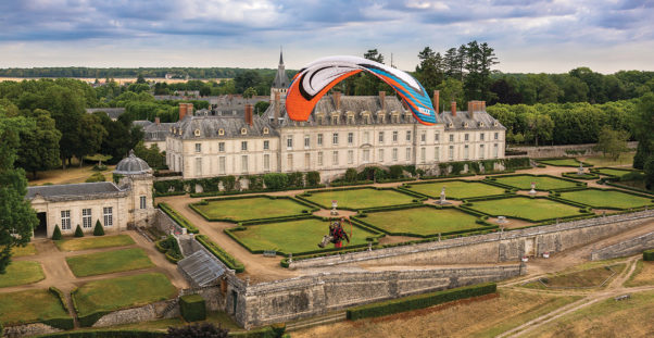 Luc Trepanier paramotoring in front of Chateau de Menars, France, Photo Jeff Hamann