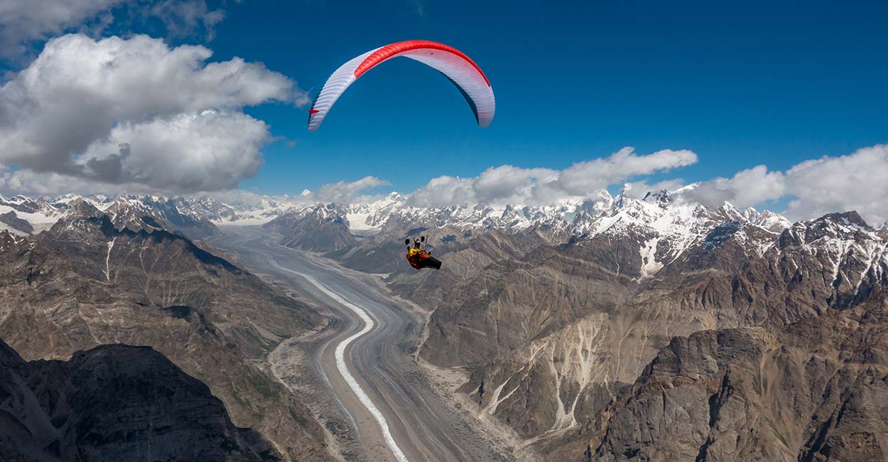 Damien Lacaze Paragliding above the Biafo Glacier
