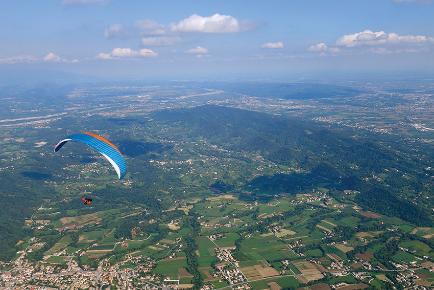 Thermalling in the pre-Alpine flatlands of Bassano, Italy. Photo: Kelly Farina / Mastering Paragliding