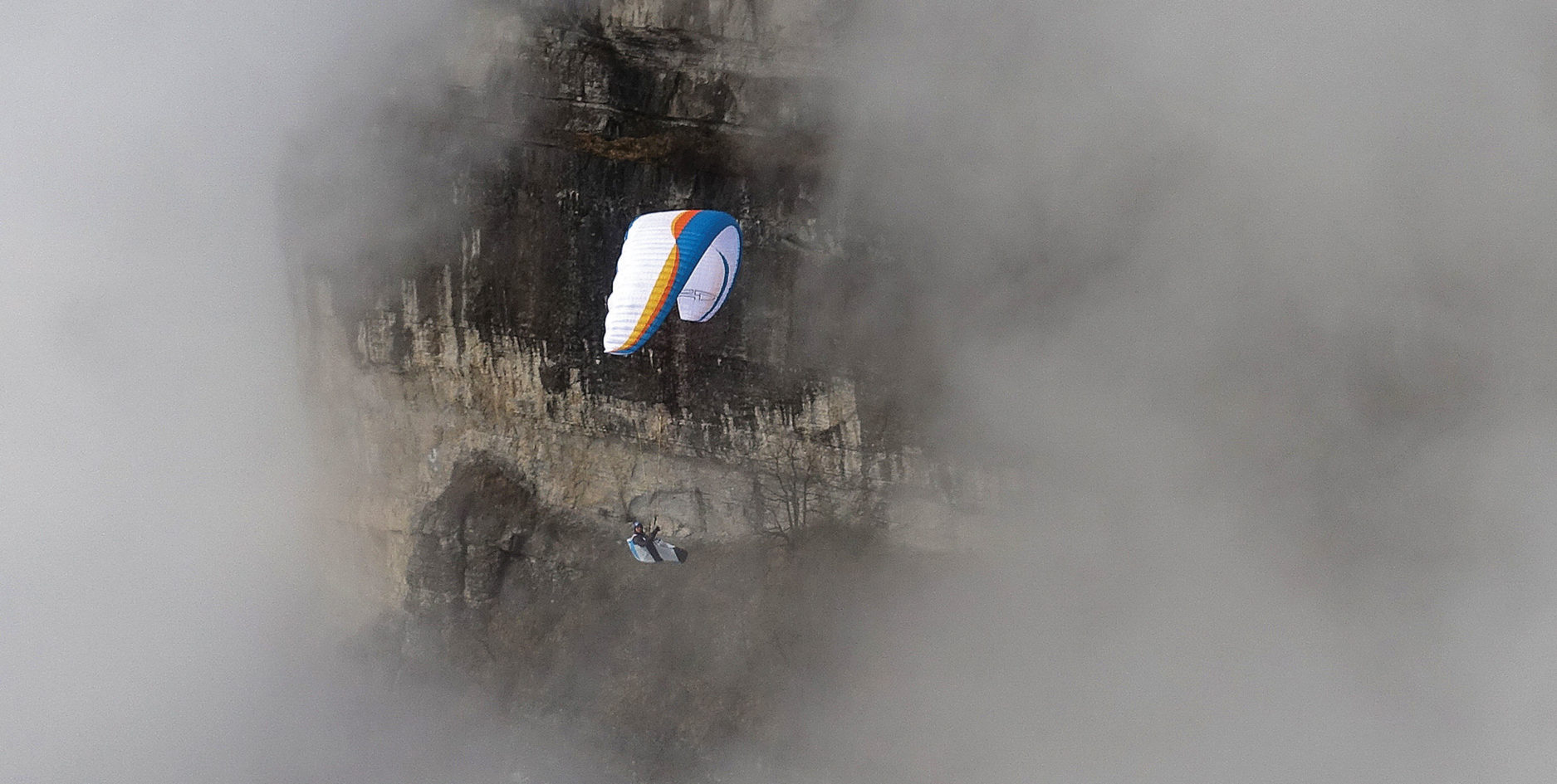Paraglider in cloud