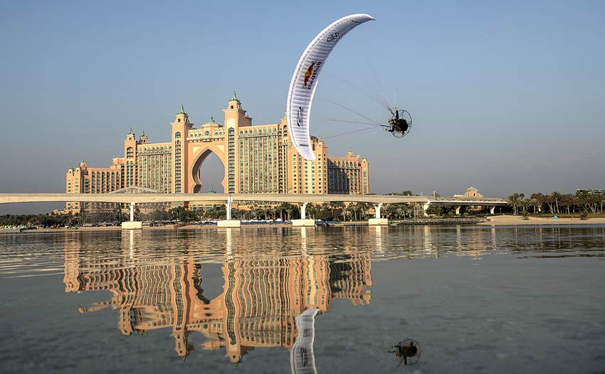 Horacio Llorens paramotoring by the Atlantis Hotel in Dubai. Photo: Naim Chidaic