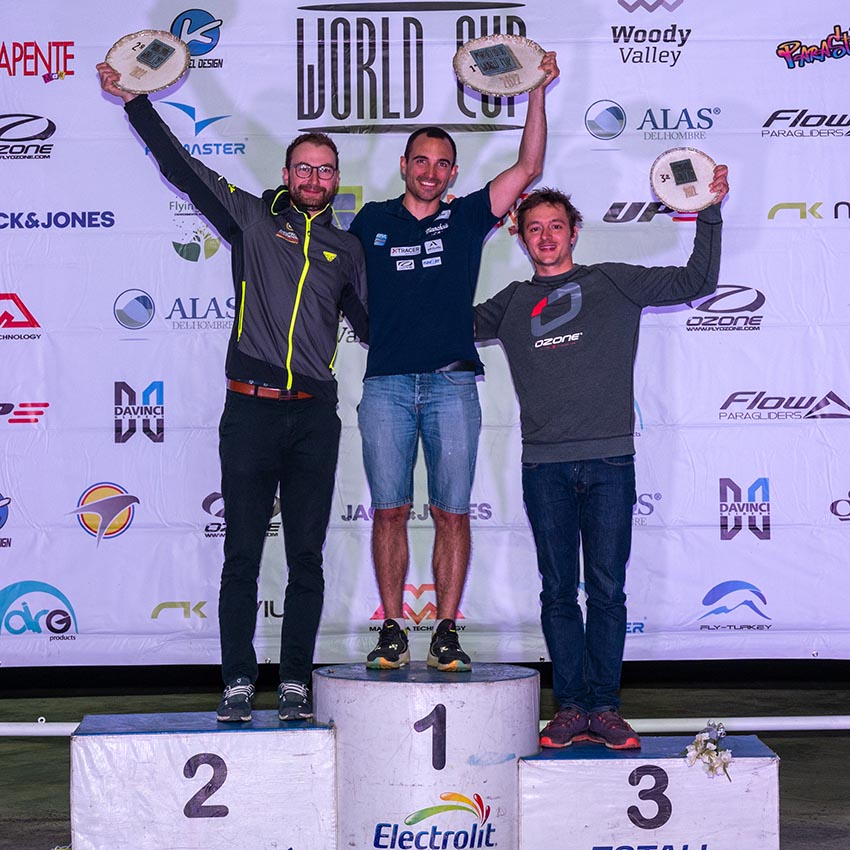 Paragliding World Cup Super Final Champion 2022 Honorin Hamard, with Philipp Haag and Baptiste Lambert. Photo: Nicole Holmes