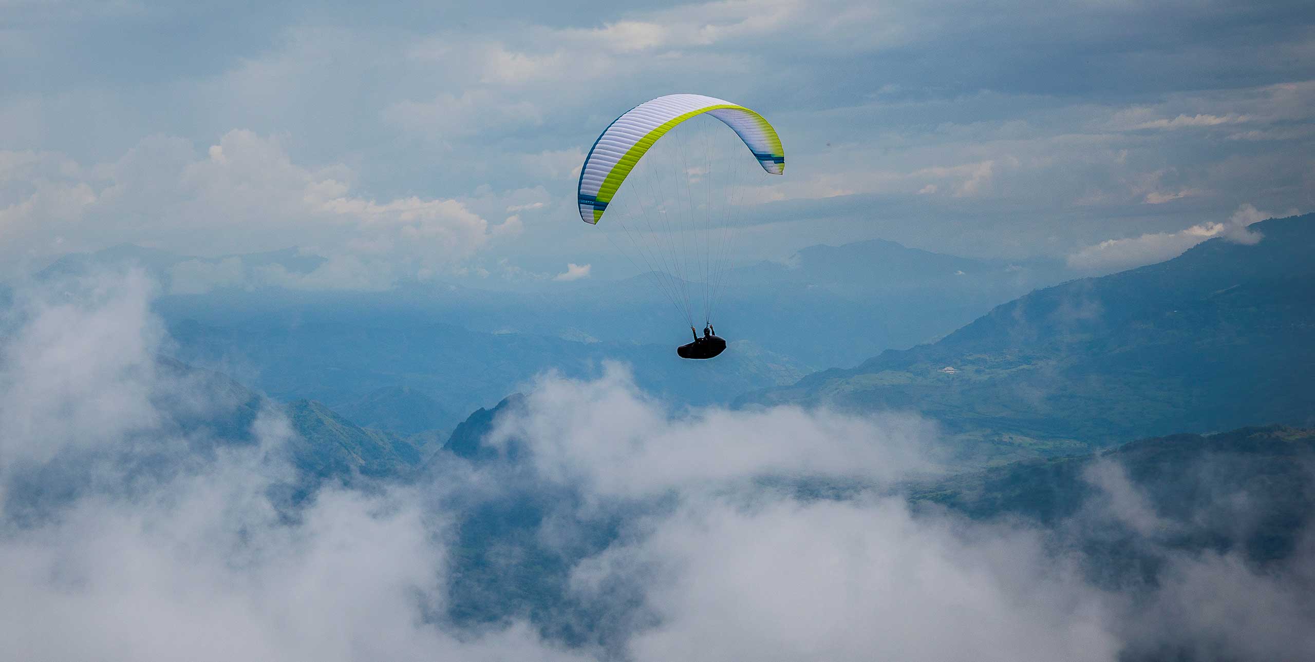 Paragliding above the clouds in Colombia. Photo: Marcus King