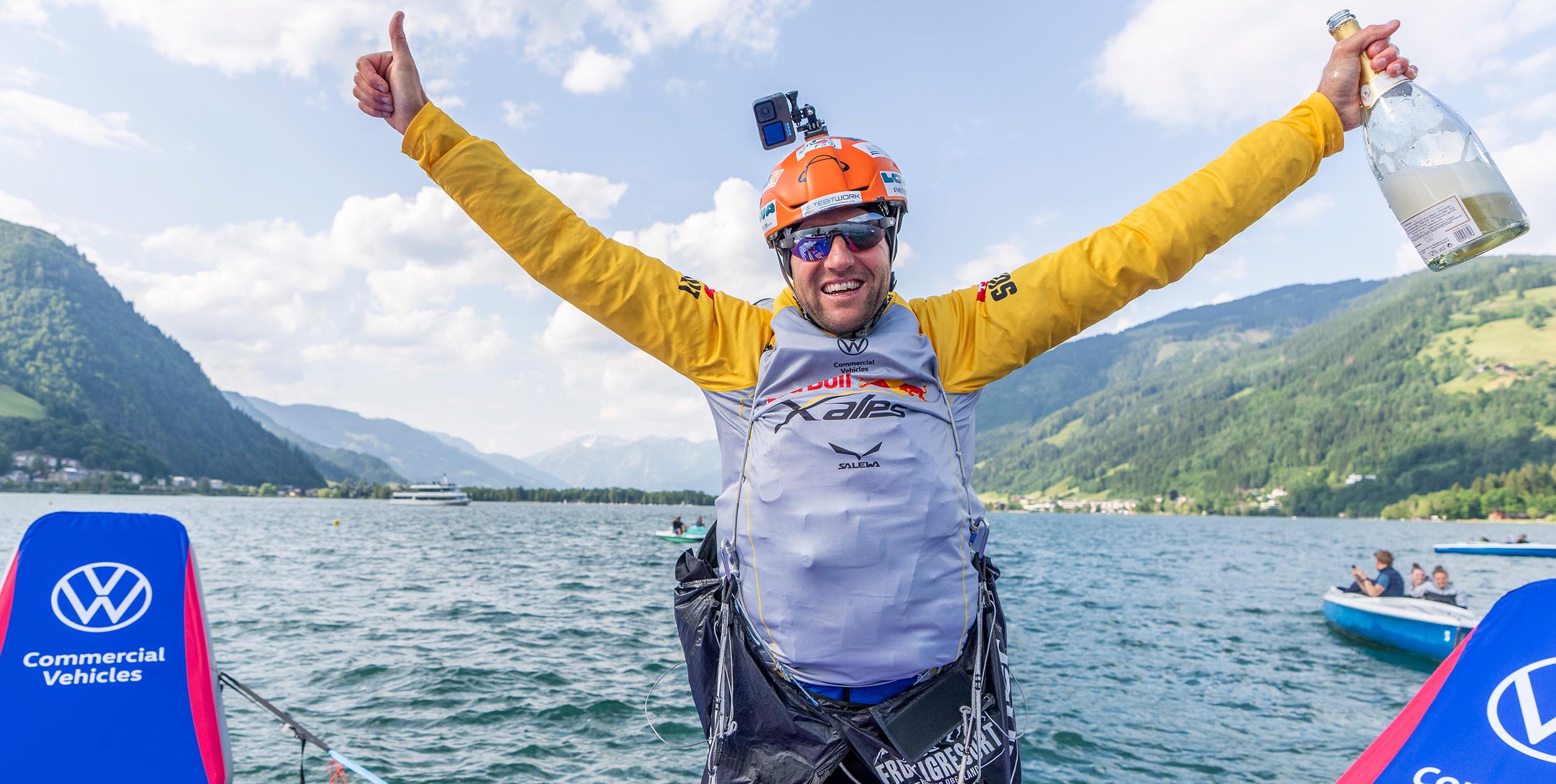 Chrigel Maurer on the raft in Zell am See after winning the 2023 Red Bull X-Alps in record time. Photo: Christian Lorenz / Red Bull Content Pool