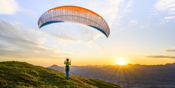 Paragliding-at-sunrise-Adi-Geisegger