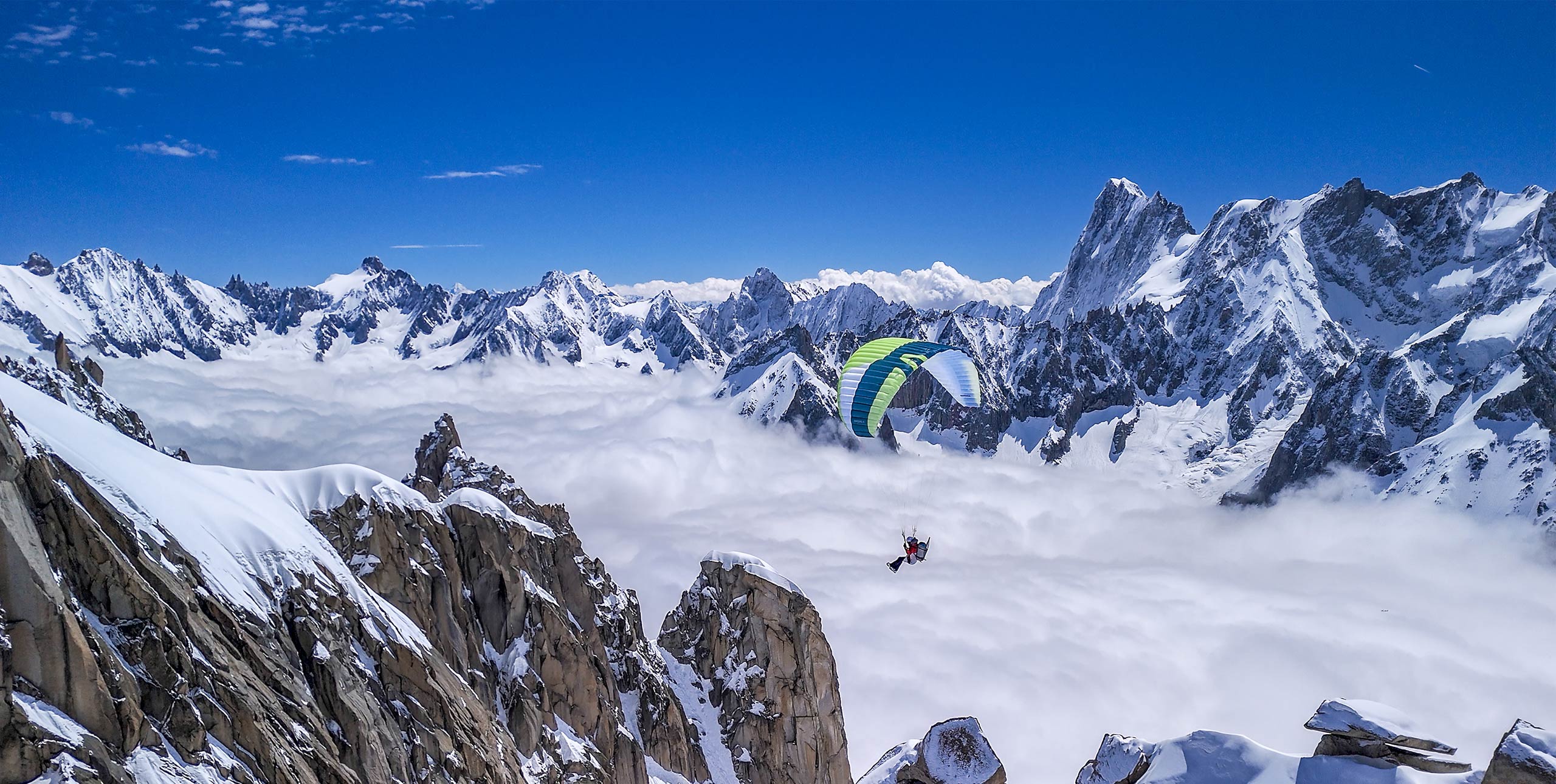 Passing the Flame A crew of 24 different sports personalities were on the Aiguille du Midi, Mont Blanc, to see Sandie Cochepain, top right, launch and fly with the Olympic flame Photos: Etienne Grillot and Bertrand Delapierre