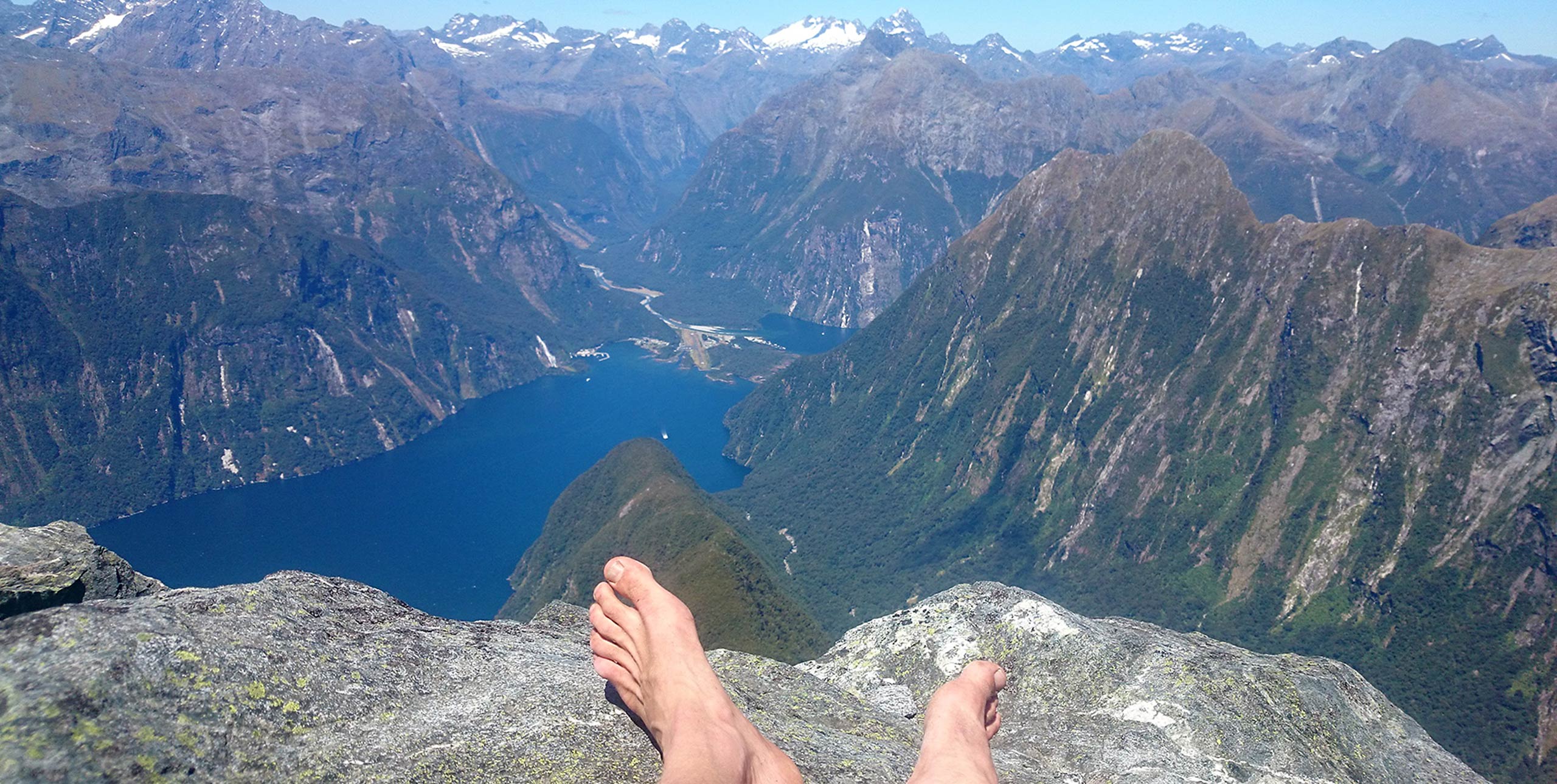A view from Gertrude Saddle on Mitre Peak, South Island, New Zealand, with a view to Milford Sound.