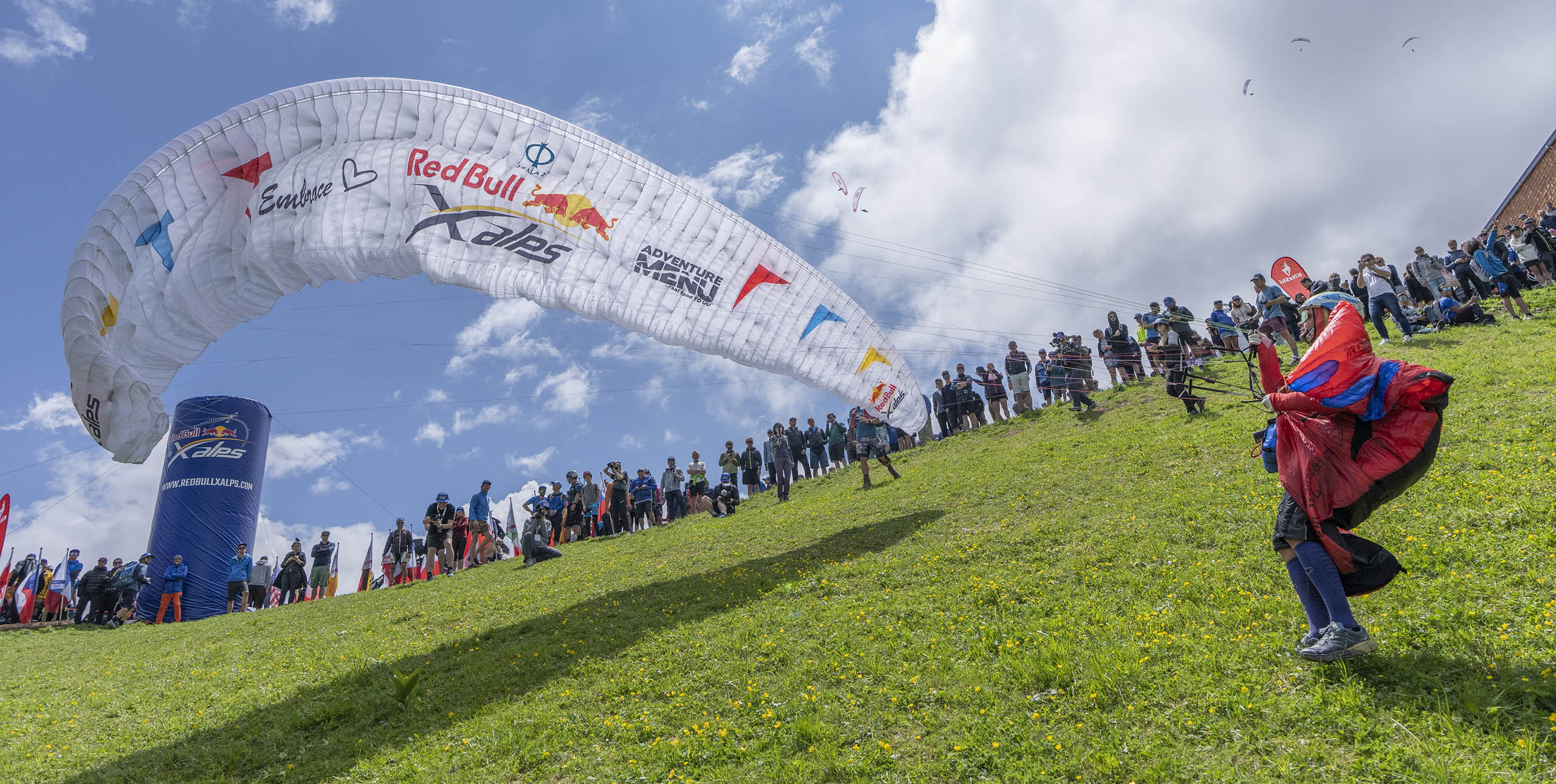 Kinga Masztalerz launches at the start of the Red Bull X-Alps 2023. Photo: Christian Lorenz / Red Bull Content Pool