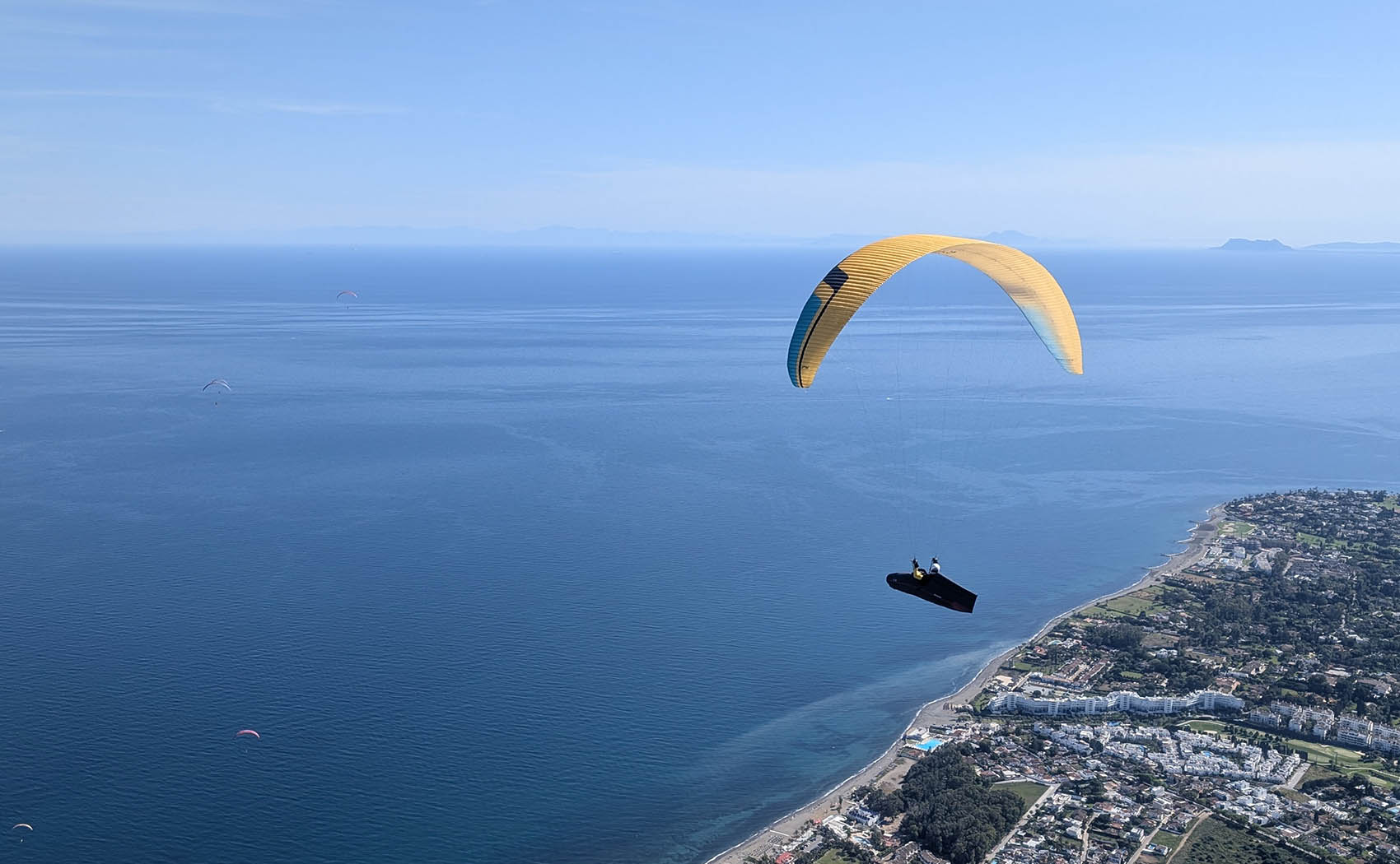 Arriving at goal at the beach at the Paragliding World Cup in Algodonales 2025. Photo: Xavier Laporte