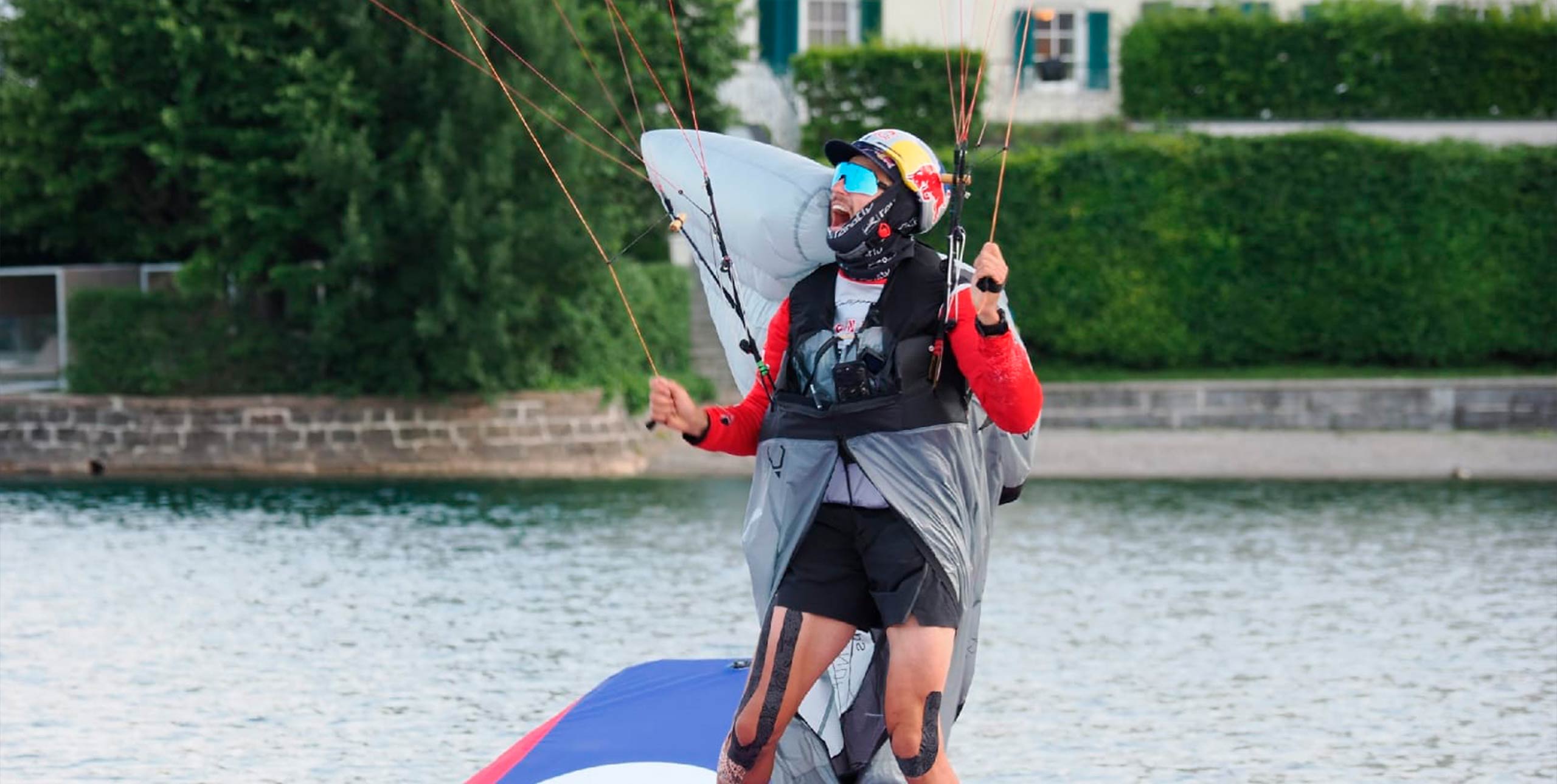 Aaron Durogati lands on the raft at the end of the Red Bull X-Alps 2025. Photo: Erwin Voogt