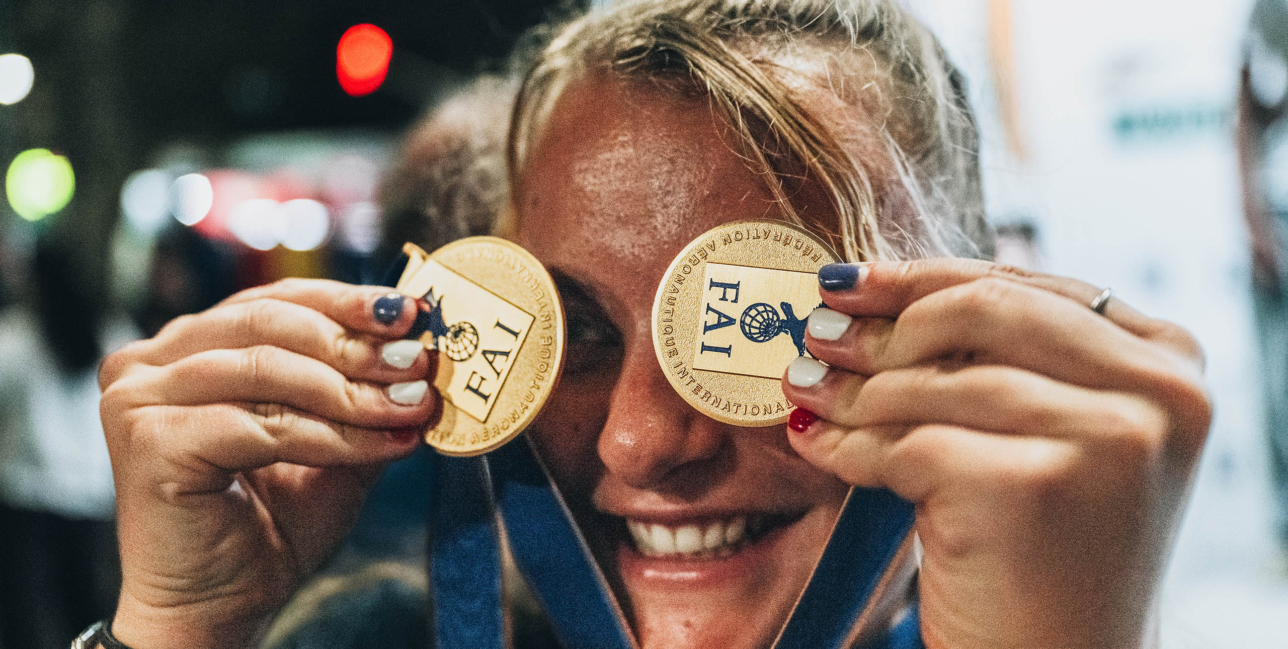 Constance Mettetal celebrates her gold medals at the Paragliding World Championships 2025 in Brazil. Photo: Tim Rochas