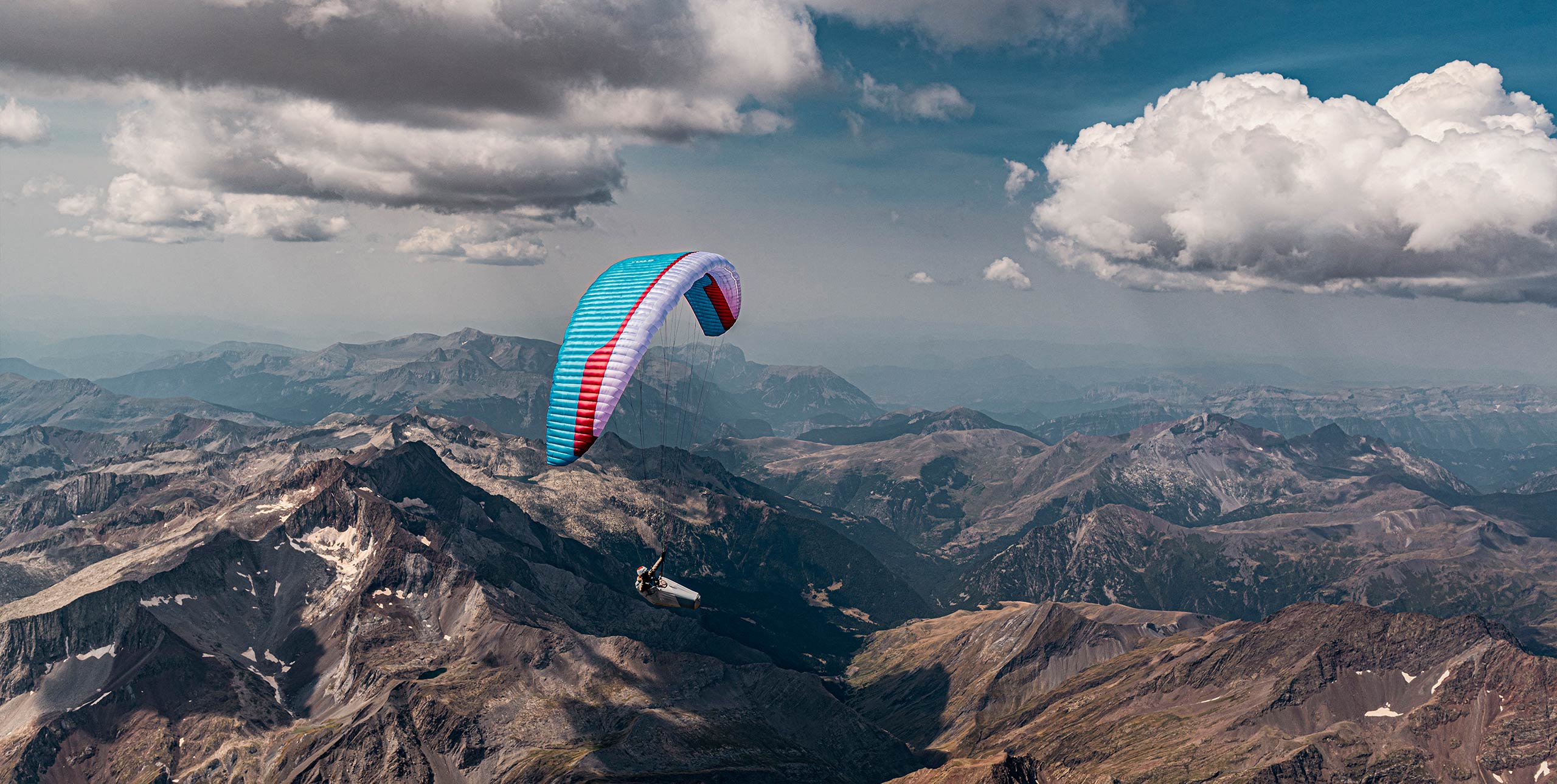 Paragliding at high altitude above the French Pyrenees. Gin Gliders. Photo: Jerome Maupoint