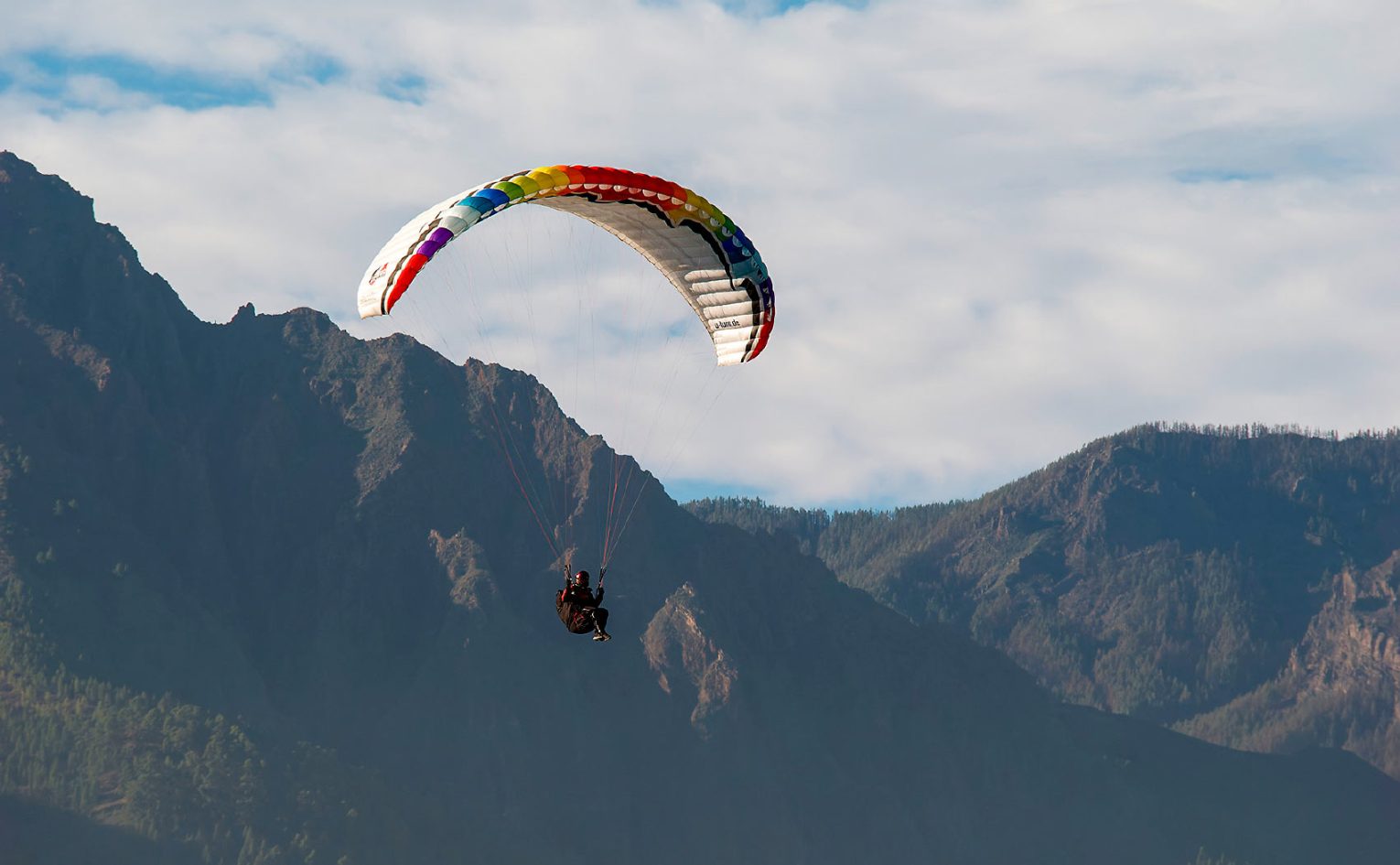 Flying on front of the mountains