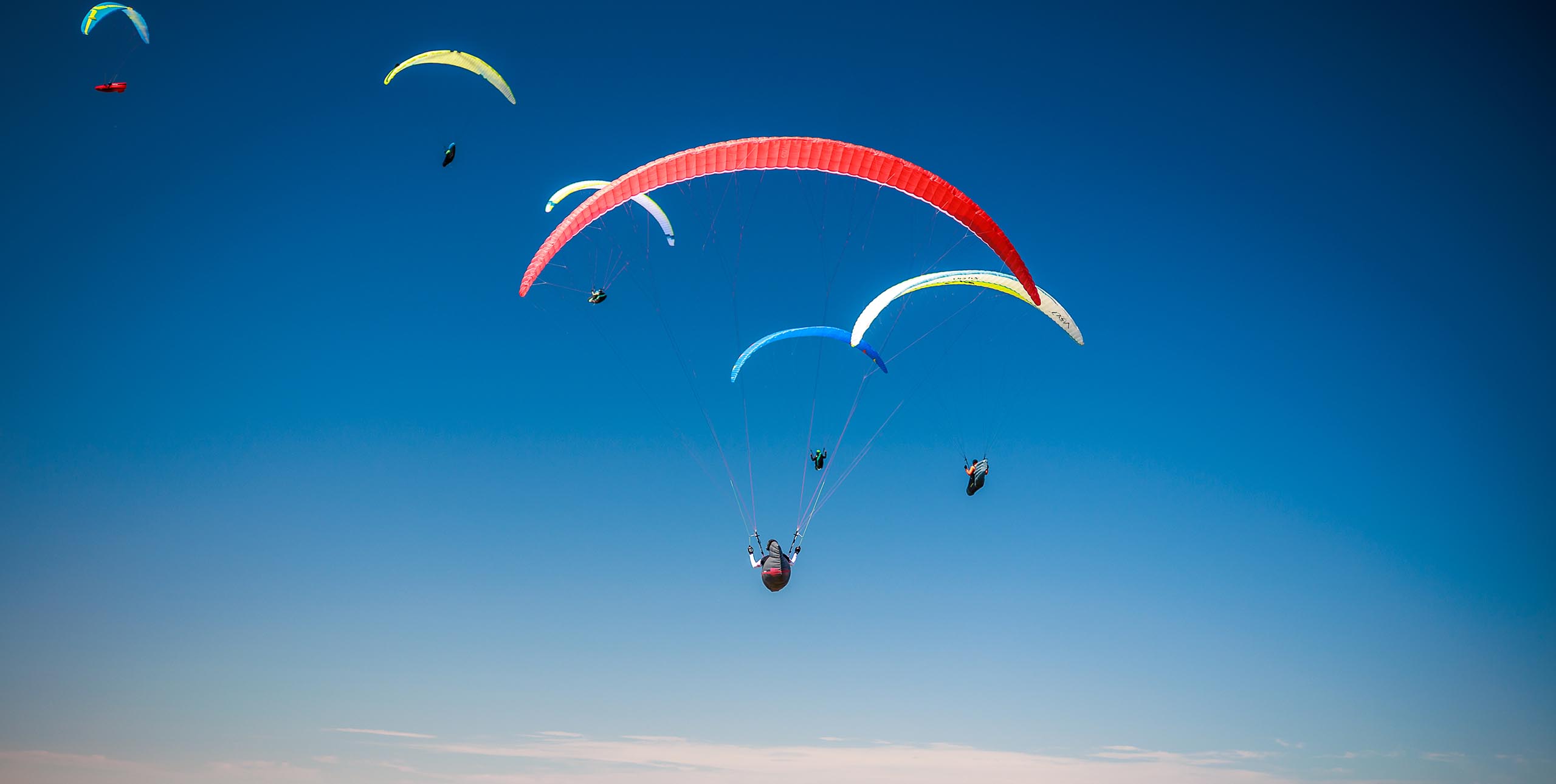 Flying into a new year for 2026. Paragliding in the blue sky. Photo: Marcus King