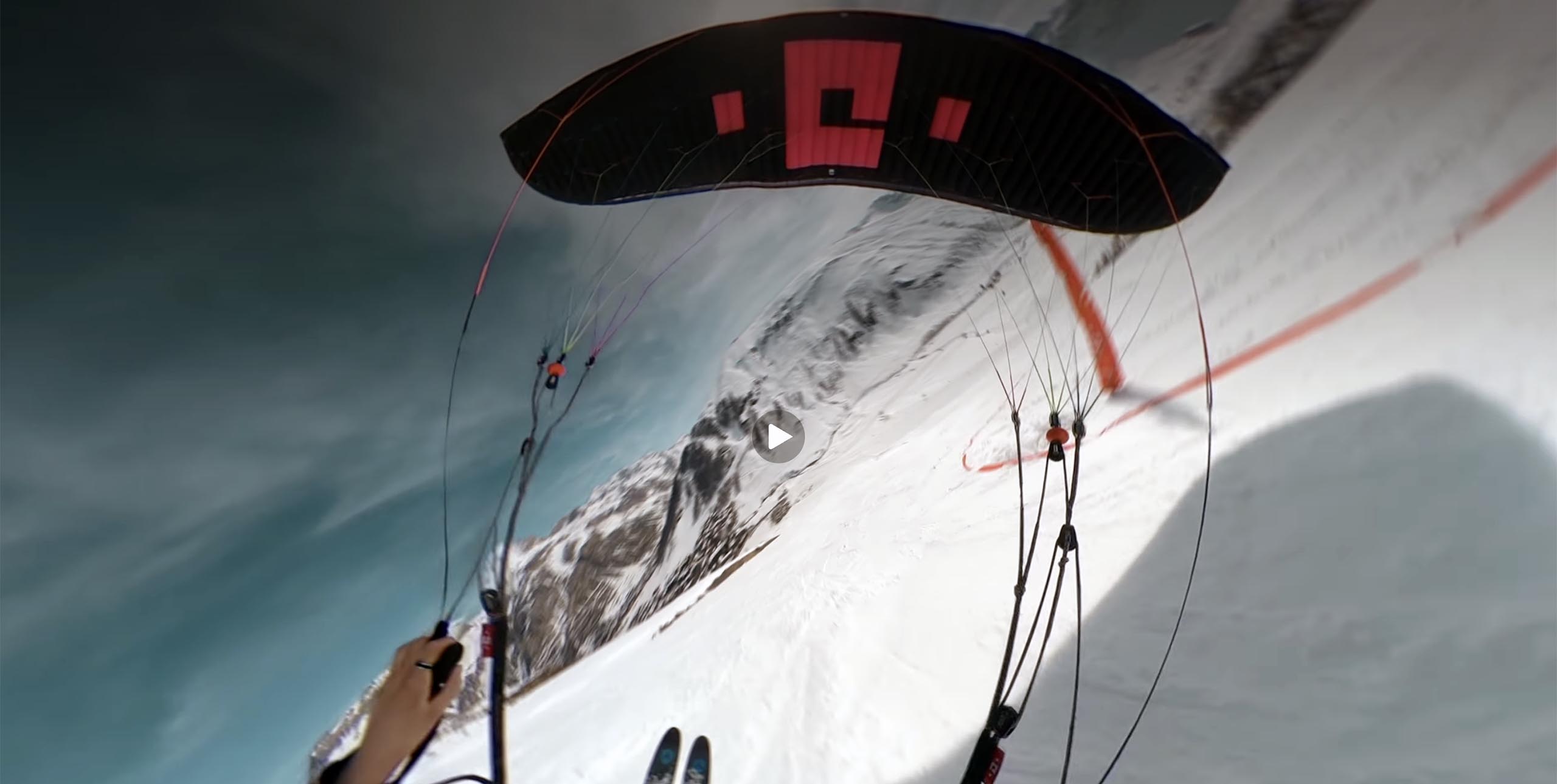 Flying a parakite on a slalom race track during the world's first parakite competition
