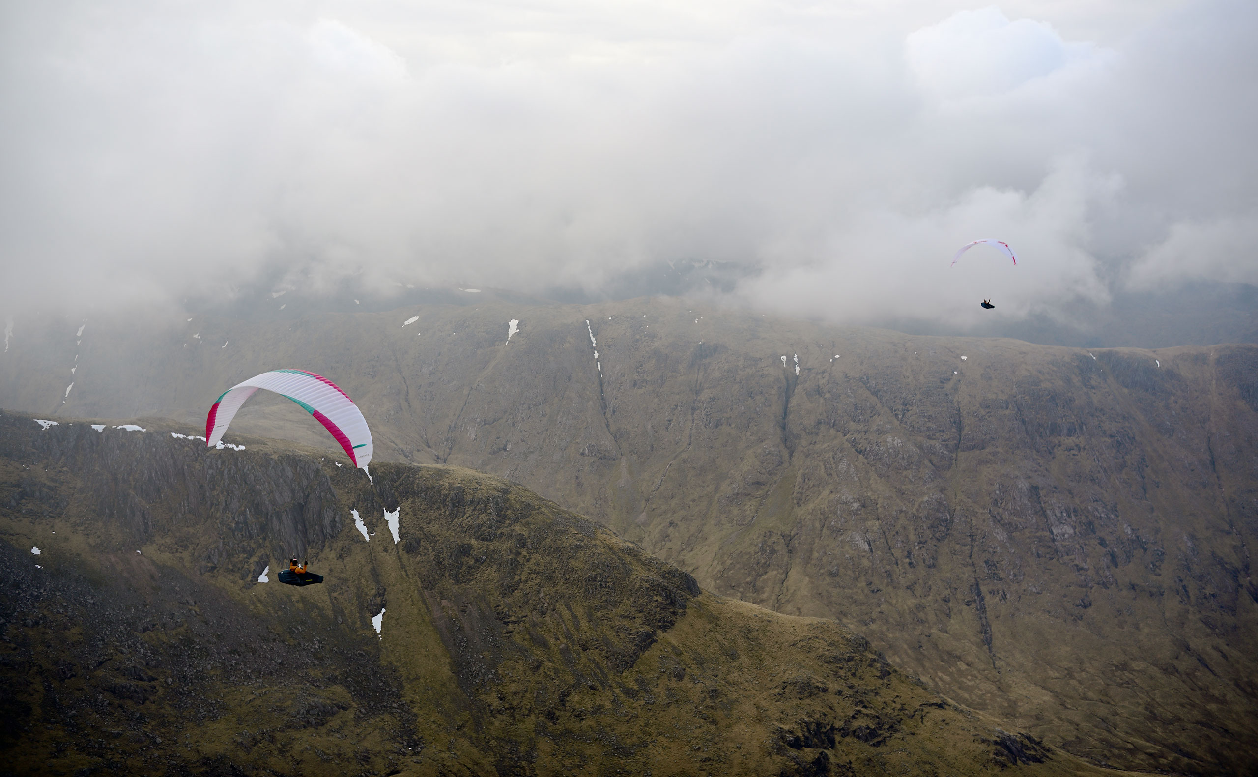 Soaring under the cloud in Glencoe during the X-Scotia 2026. Photo: Andy Howson