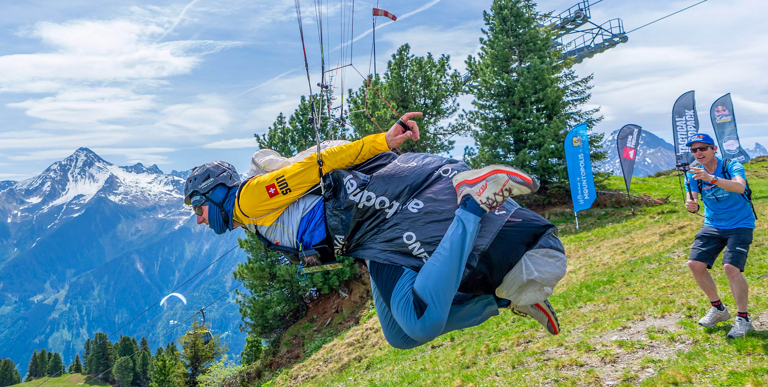 Chrigel Maurer launches during the Red Bull X-Alps Challenger 2026.
