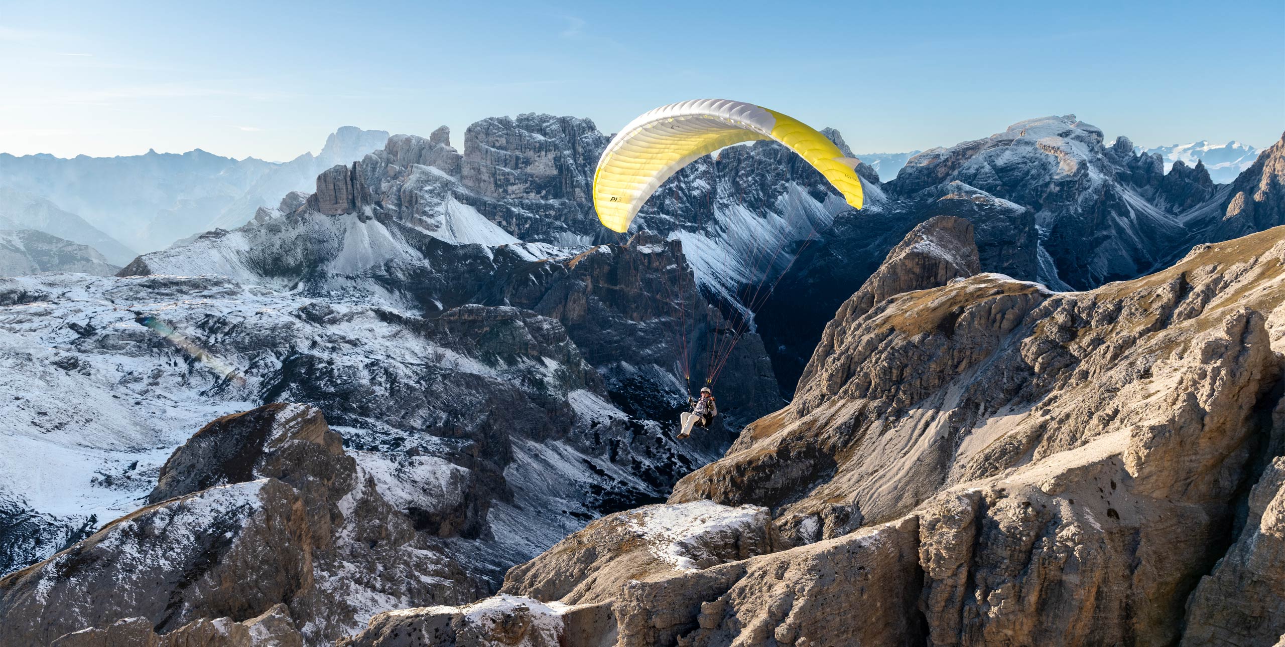 Vali Burk paragliding in the Dolomites