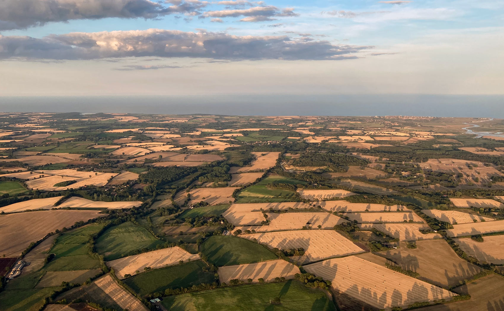 Ben Dry approaching the coast at the end of his UK paragliding record flight in August 2026